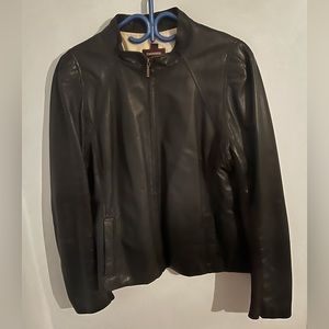 Danier Genuine Leather Jacket with stretchy cotton panel. XL